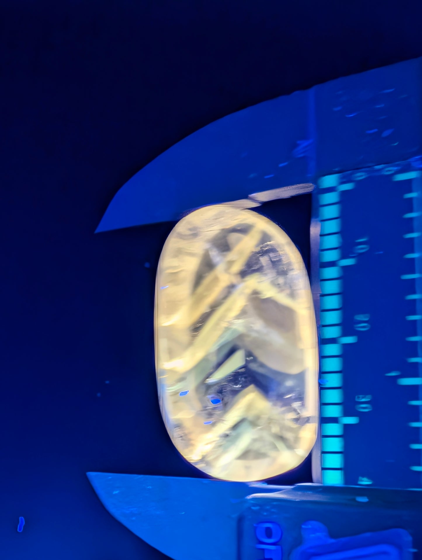 Amethyst & Powellite Inclusion - UV Reactive Yellow Cabochon.