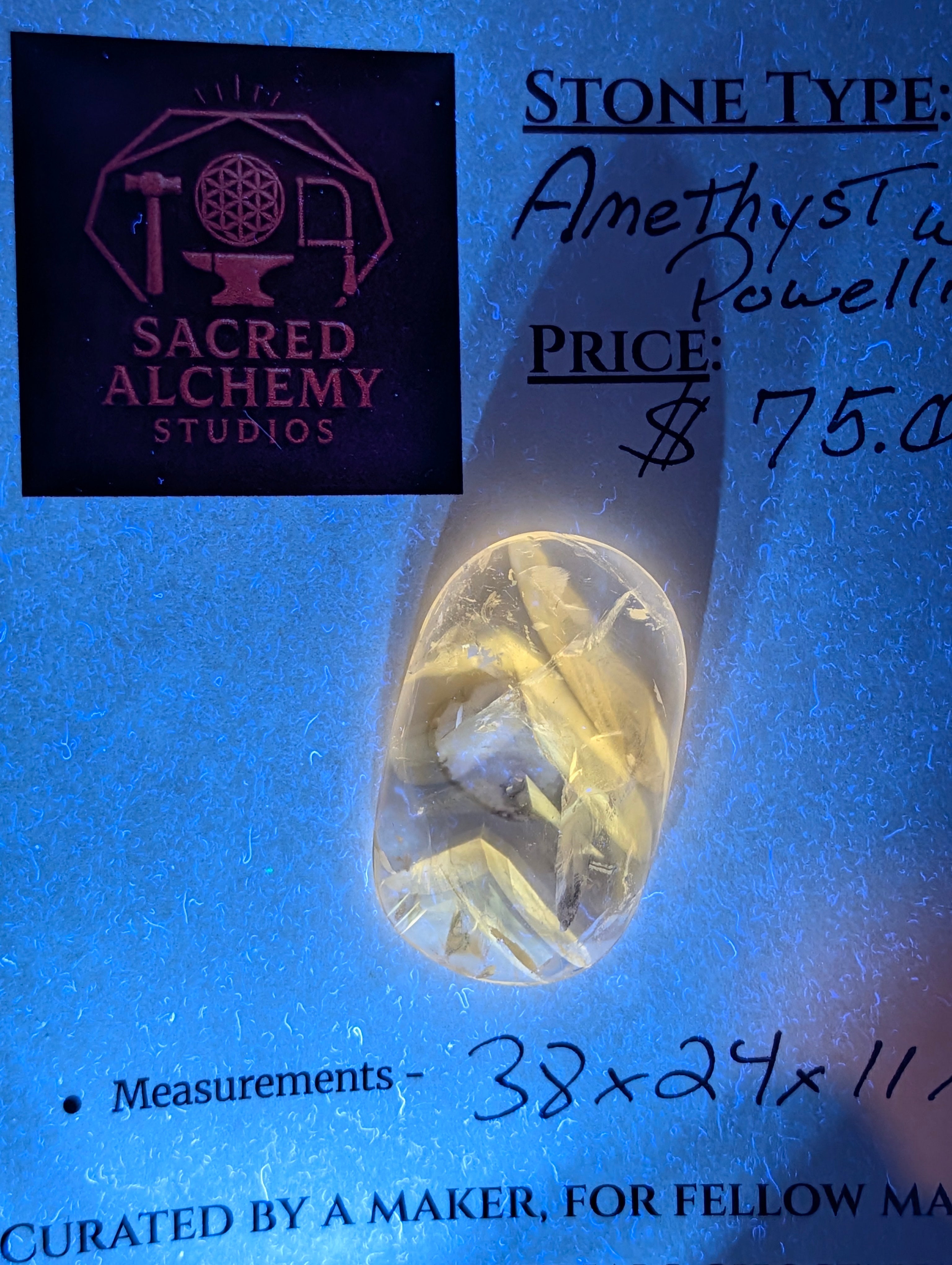 Amethyst & Powellite Inclusion - UV Reactive Yellow Cabochon. by Sacred Alchemy Studios